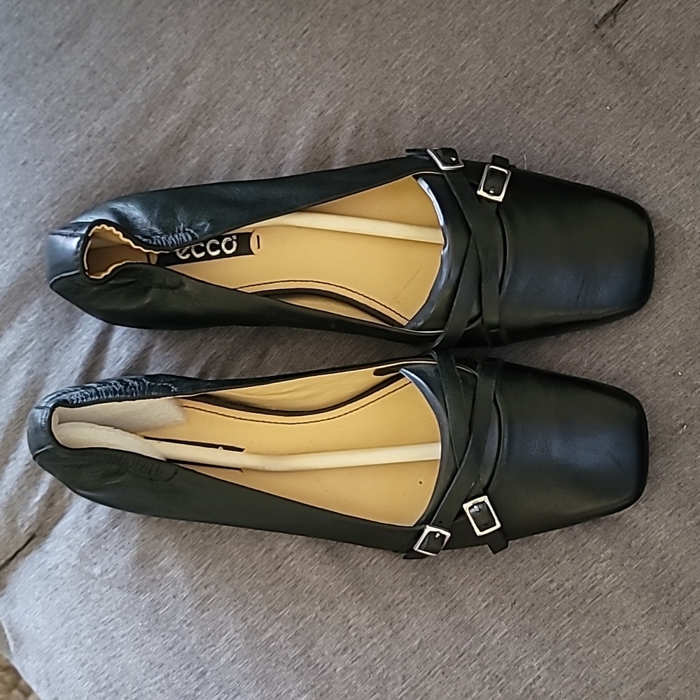 Ecco black leather flats with silver buckles. NWOT